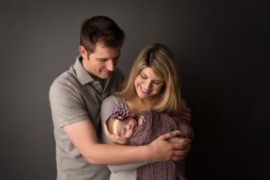 Vancouver_WA_Newborn_Photographer_Gretchen_Barros_Photography_Parents_Holding_Newborn_Girl