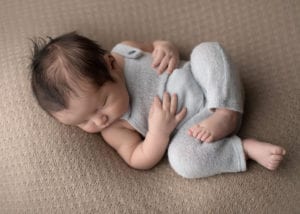 Portland Newborn Photographer baby boy in blue overalls
