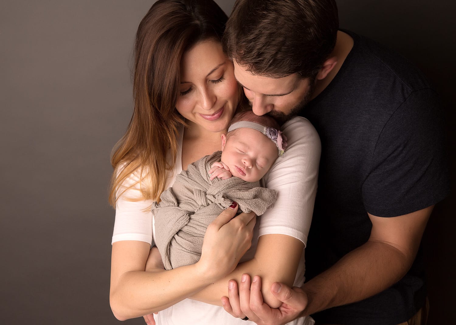 Portland Newborn Photographer dad kissing baby