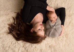 Portland Newborn Photographer red haired mom holding newborn