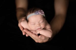 Portland Newborn Photographer Newborn girl in dad's hands