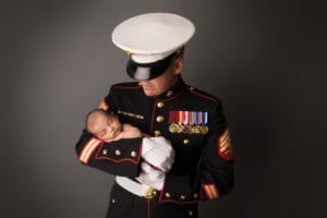 Portland Newborn Photographer Marine in dress uniform holding baby
