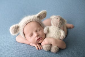 Portland Newborn Photographer baby boy holding lamb