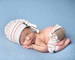 Portland Newborn Photographer newborn in striped outfit