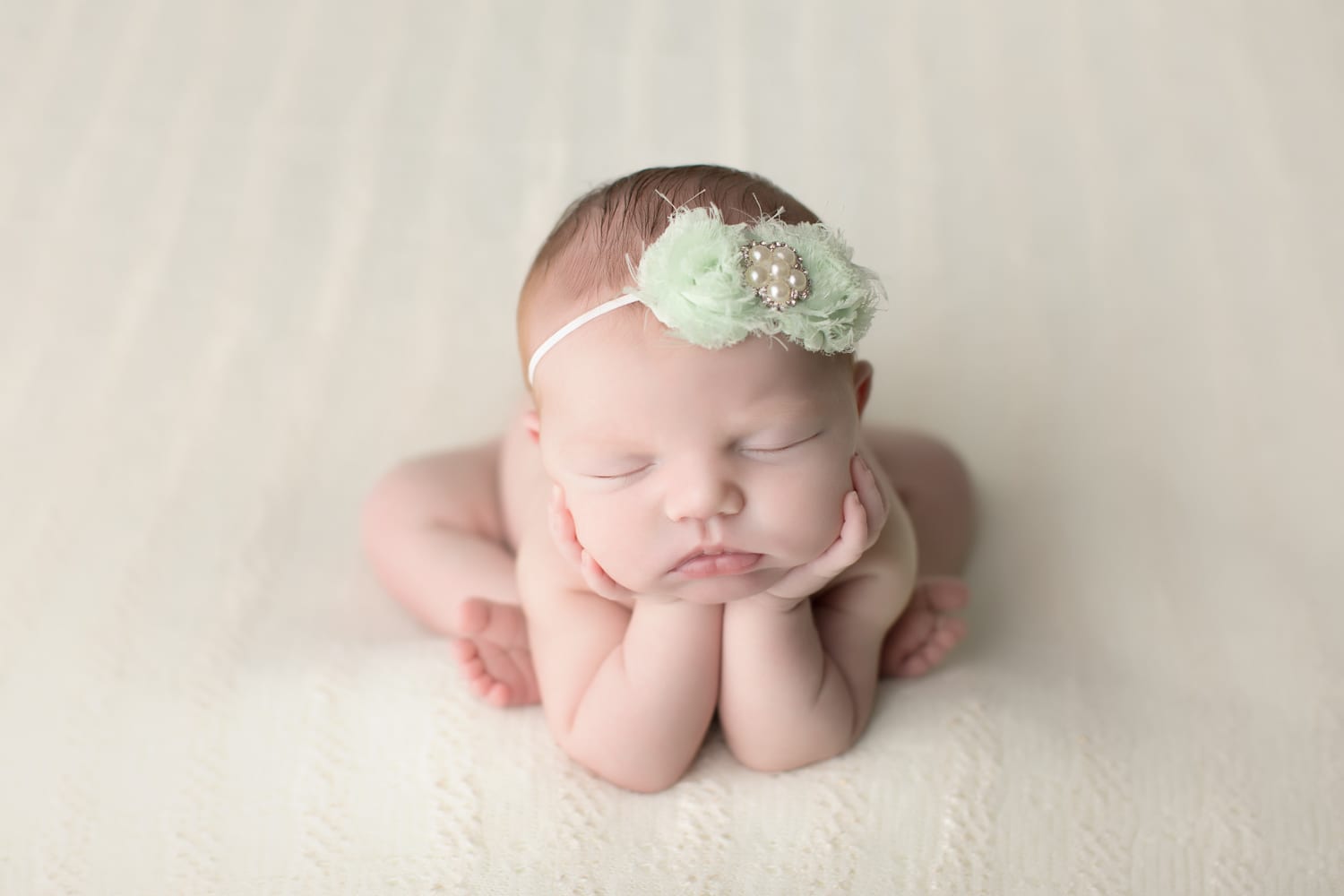 Portland Newborn Photographer bay girl froggy pose with mint headband