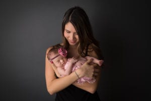 Portland Newborn Photographer beautiful mom holding baby girl