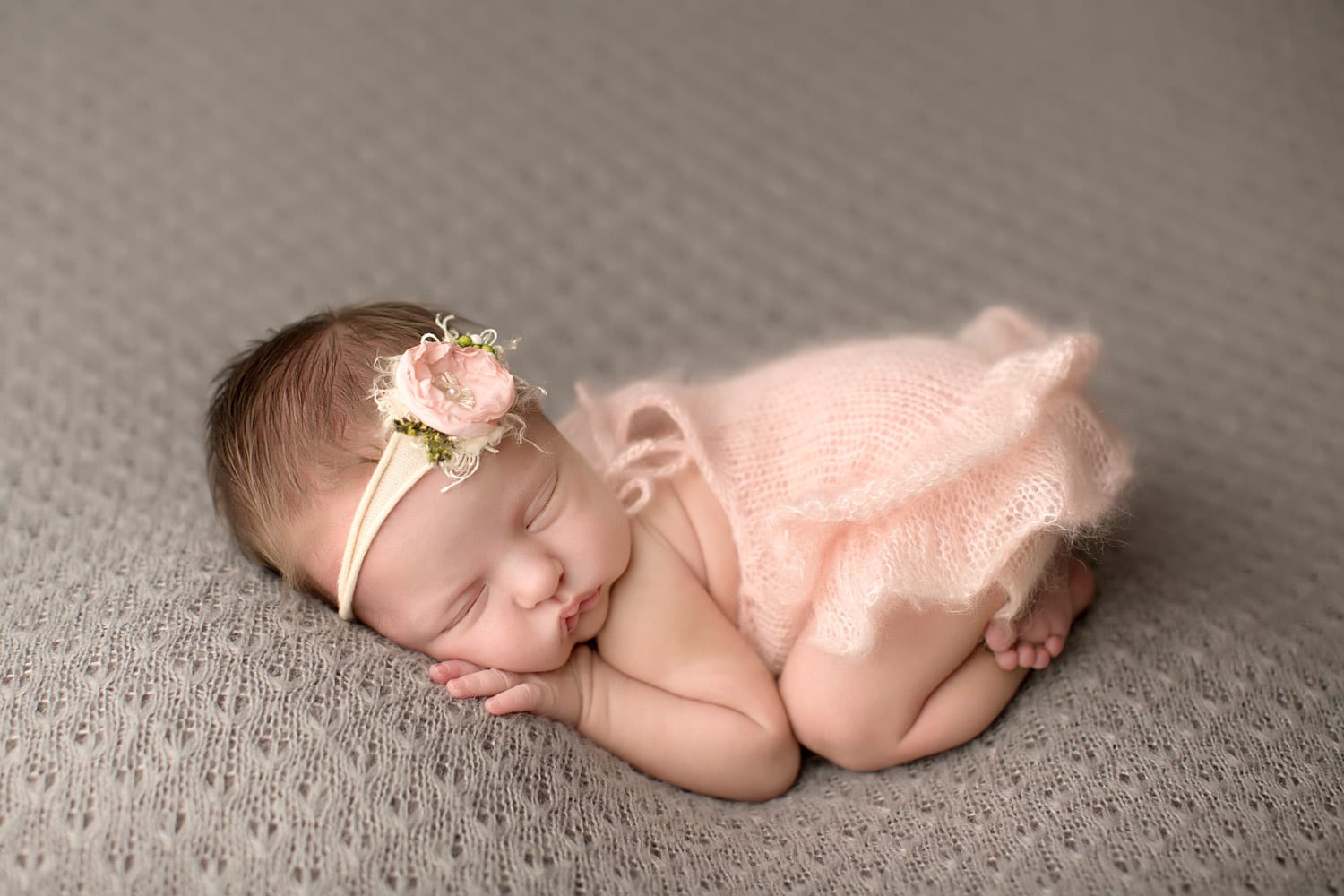Portland Newborn Photographer Baby in Pink knitted ruffle onsie
