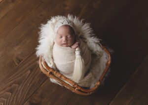 Vancouver WA Newborn Photographer Swaddle in basket